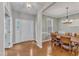 Spacious dining room with hardwood floors and ample seating for formal gatherings at 8504 Delavan Cir, Raleigh, NC 27613