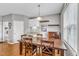 Dining room with a large wooden table, seating for six, and a built-in buffet at 8504 Delavan Cir, Raleigh, NC 27613