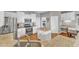Bright kitchen featuring stainless steel appliances, granite countertops, and white cabinets at 8504 Delavan Cir, Raleigh, NC 27613