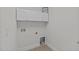 A well-equipped laundry room with cabinets and modern utility hookups at 851 Dotson Way, Apex, NC 27523
