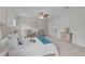 Bright bedroom featuring a ceiling fan, neutral walls, and stylish furnishings at 851 Dotson Way, Apex, NC 27523