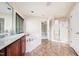 Bright bathroom featuring a soaking tub, shower, and a vanity with double sinks at 9 Sandhill Ln, Durham, NC 27713