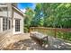 Spacious wooden deck with a built-in bench, perfect for outdoor relaxation and entertaining at 9 Sandhill Ln, Durham, NC 27713