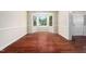 Bright dining room boasts a bay window and beautiful hardwood flooring at 9 Sandhill Ln, Durham, NC 27713
