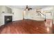 Living room with fireplace, staircase, and neutral color palette at 9 Sandhill Ln, Durham, NC 27713