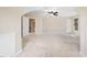 Spacious main bedroom with carpet floors, neutral colors, a fan, and natural lighting from a window at 9 Sandhill Ln, Durham, NC 27713