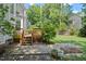 Spacious grassy backyard, perfect for outdoor activities, with backyard deck at 9400 Leslieshire Dr, Raleigh, NC 27615