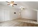 This bedroom boasts carpet, ceiling fans and a double door closet for ample storage at 9400 Leslieshire Dr, Raleigh, NC 27615