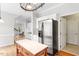 Bright kitchen featuring stainless steel appliances and an island workspace at 9400 Leslieshire Dr, Raleigh, NC 27615