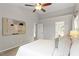 Spacious main bedroom with high ceilings, neutral walls, and an ensuite bathroom at 9400 Leslieshire Dr, Raleigh, NC 27615