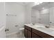 Bathroom featuring a double sink vanity, mirror, and tile flooring at 95 Cordoba Dr, Franklinton, NC 27525