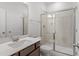 Modern bathroom featuring a single sink vanity and a walk-in shower at 95 Cordoba Dr, Franklinton, NC 27525