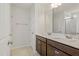 Bathroom featuring a double sink vanity with modern fixtures at 95 Cordoba Dr, Franklinton, NC 27525