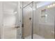 Bathroom featuring glass-enclosed tile shower with tiled niche at 95 Cordoba Dr, Franklinton, NC 27525