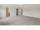 Large bedroom featuring plush carpet, tray ceiling, and ceiling fan at 95 Cordoba Dr, Franklinton, NC 27525