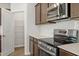 Gourmet kitchen features stainless steel appliances, white countertops, and tons of storage at 95 Cordoba Dr, Franklinton, NC 27525