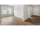Bright living room boasts beautiful floors and lots of natural light from the large windows at 95 Cordoba Dr, Franklinton, NC 27525