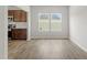 Bright living room boasts beautiful floors and lots of natural light from the large windows at 95 Cordoba Dr, Franklinton, NC 27525