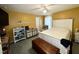 Well-lit bedroom with a large bed, chest, and a cozy ambiance for restful nights at 96 Holly Cir, Henderson, NC 27537