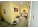 Hallway offers seating, storage, and decor with seamless transition and functionality throughout the space at 96 Holly Cir, Henderson, NC 27537