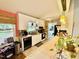 Kitchen with white cabinets, appliances, and an undermount sink for a clean and functional design at 96 Holly Cir, Henderson, NC 27537