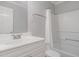 A clean, bright bathroom with a white vanity, toilet and bathtub with shower, providing a functional and modern space at 1002 Kingswood Dr # A, Chapel Hill, NC 27517