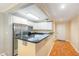 Bright kitchen features stainless steel appliances, granite countertops, and a breakfast bar at 1002 Kingswood Dr # A, Chapel Hill, NC 27517