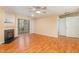 Spacious living area with a fireplace, neutral paint and access to additional rooms at 1002 Kingswood Dr # A, Chapel Hill, NC 27517