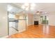 Comfortable floor plan showing kitchen and living room, complete with fireplace at 1002 Kingswood Dr # A, Chapel Hill, NC 27517