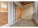 A well-maintained patio with stone flooring, offering a private outdoor living space with easy access through sliding glass doors at 1002 Kingswood Dr # A, Chapel Hill, NC 27517