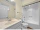 Bathroom featuring a shower-tub combo, toilet, and vanity with sink at 1010 Mill Pointe Way, Elon, NC 27244