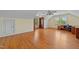 Bonus room with hardwood floors, natural light, and built-in desk space at 1010 Mill Pointe Way, Elon, NC 27244