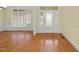 Inviting foyer with leaded glass door, hardwood floors, and large window at 1010 Mill Pointe Way, Elon, NC 27244