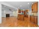 Open floor plan showing kitchen and fireplace with white built-ins at 1010 Mill Pointe Way, Elon, NC 27244