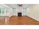 Bright living room featuring fireplace and built-ins at 1010 Mill Pointe Way, Elon, NC 27244