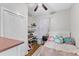 Small bedroom with hardwood floors and ample storage space at 1011 Burch Ave, Durham, NC 27701