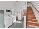 Laundry area with access to the staircase at 1011 Burch Ave, Durham, NC 27701