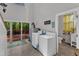 Bright laundry room with access to the deck at 1011 Burch Ave, Durham, NC 27701