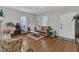 Cozy living room with hardwood floors, comfortable seating, and inviting decor at 1011 Burch Ave, Durham, NC 27701