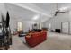 Vaulted ceiling living room offers cozy, well-lit spot to relax and entertain at 1011 Burch Ave, Durham, NC 27701