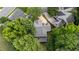 Charming home with lush surrounding trees and a well-maintained gray roof at 104 Kylesku Ct, Apex, NC 27502