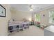 Bright bedroom featuring a loft bed, chandelier, and plenty of room to play at 104 Kylesku Ct, Apex, NC 27502