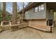 Multi-level deck shows outdoor living space and mature trees create a unique outdoor living experience at 106 Mill Rock Ct, Carrboro, NC 27510