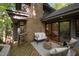 Deck with outdoor seating and access to the home interior through sliding glass doors at 106 Mill Rock Ct, Carrboro, NC 27510
