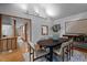 Dining room with wood table, contemporary seating, and stylish decor at 106 Mill Rock Ct, Carrboro, NC 27510