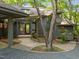 Beautiful home with a covered entrance, attached carport, and mature landscaping at 106 Mill Rock Ct, Carrboro, NC 27510