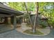 Beautiful home with a covered entrance, attached carport, and mature landscaping at 106 Mill Rock Ct, Carrboro, NC 27510