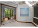 Bright foyer with skylights and an opening to the sunroom at 106 Mill Rock Ct, Carrboro, NC 27510