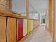 Hallway with a tile floor and unique colorful wood cabinetry at 106 Mill Rock Ct, Carrboro, NC 27510