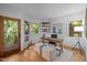 Inviting office space featuring a desk, ottomans, natural light, and outdoor views at 106 Mill Rock Ct, Carrboro, NC 27510